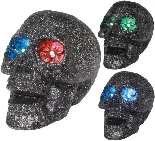 Calavera con luz en los Ojos en colores surtidos 14 cm