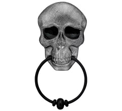 Placa de porta em forma de caveira com olhos animados e voz assustadora.