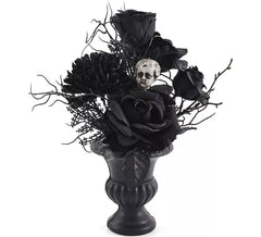 Centro de mesa com flores e anjo
