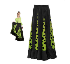 Saia sevilhana com quillas pretas e verdes e bolinhas pretas para menina