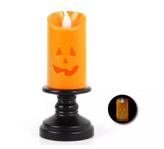 Vela de abóbora feliz com luz