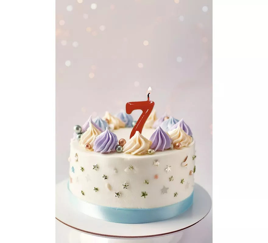 Translation missing: pt-PT.Vela roja con el número 7 para cumpleaños